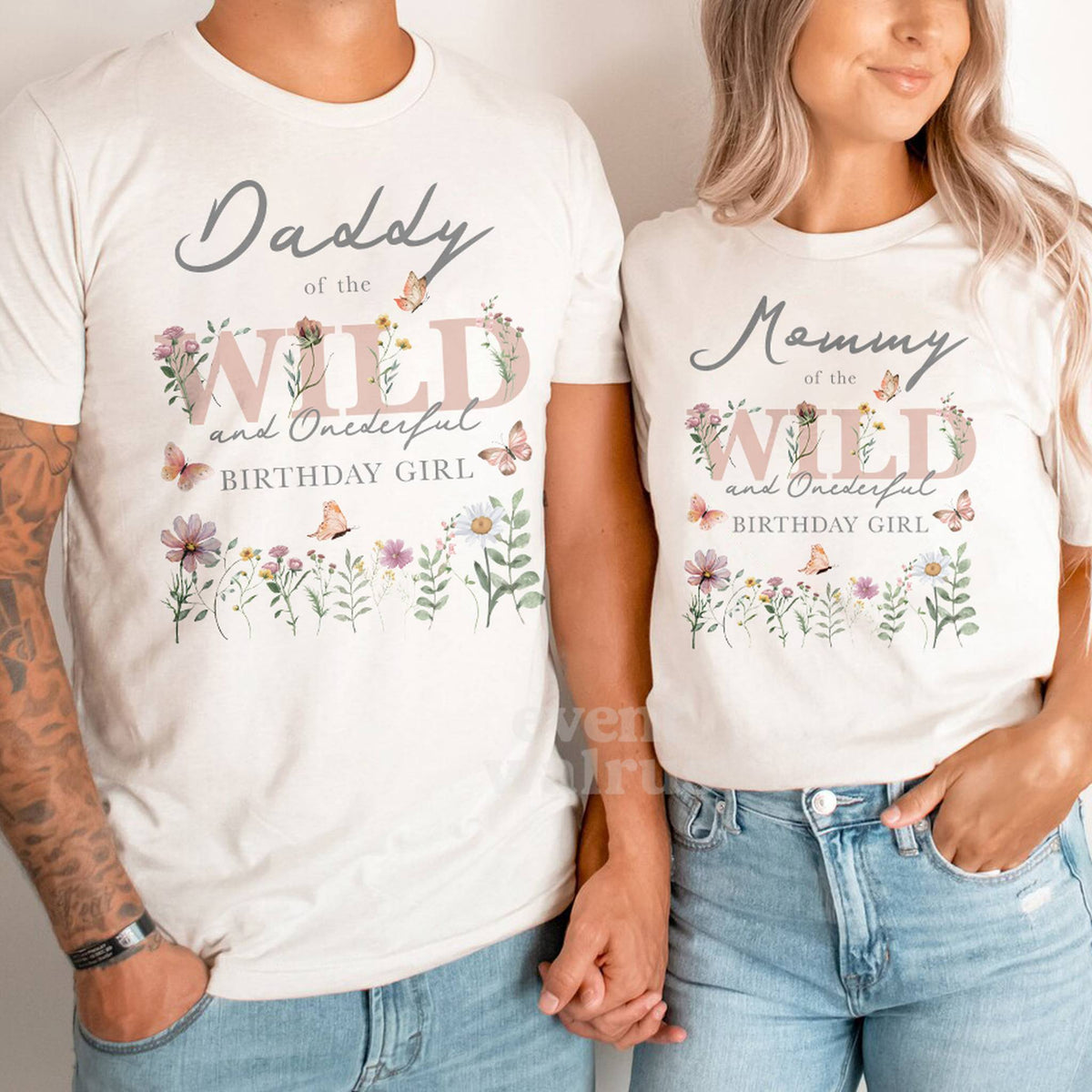 Dad and Mom in matching white Daddy and Mommy of the Wild and Onederful Birthday Girl shirts