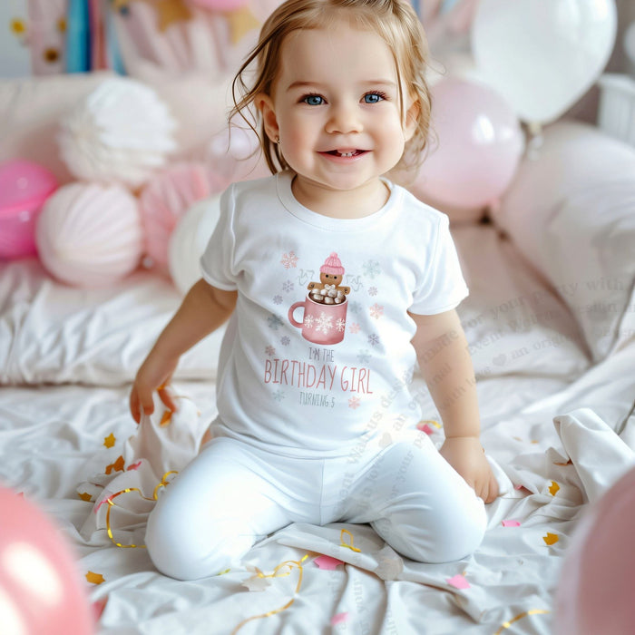 Smiling little girl among pink balloons in a white I'm the Birthday Girl Turning 5 tee.
