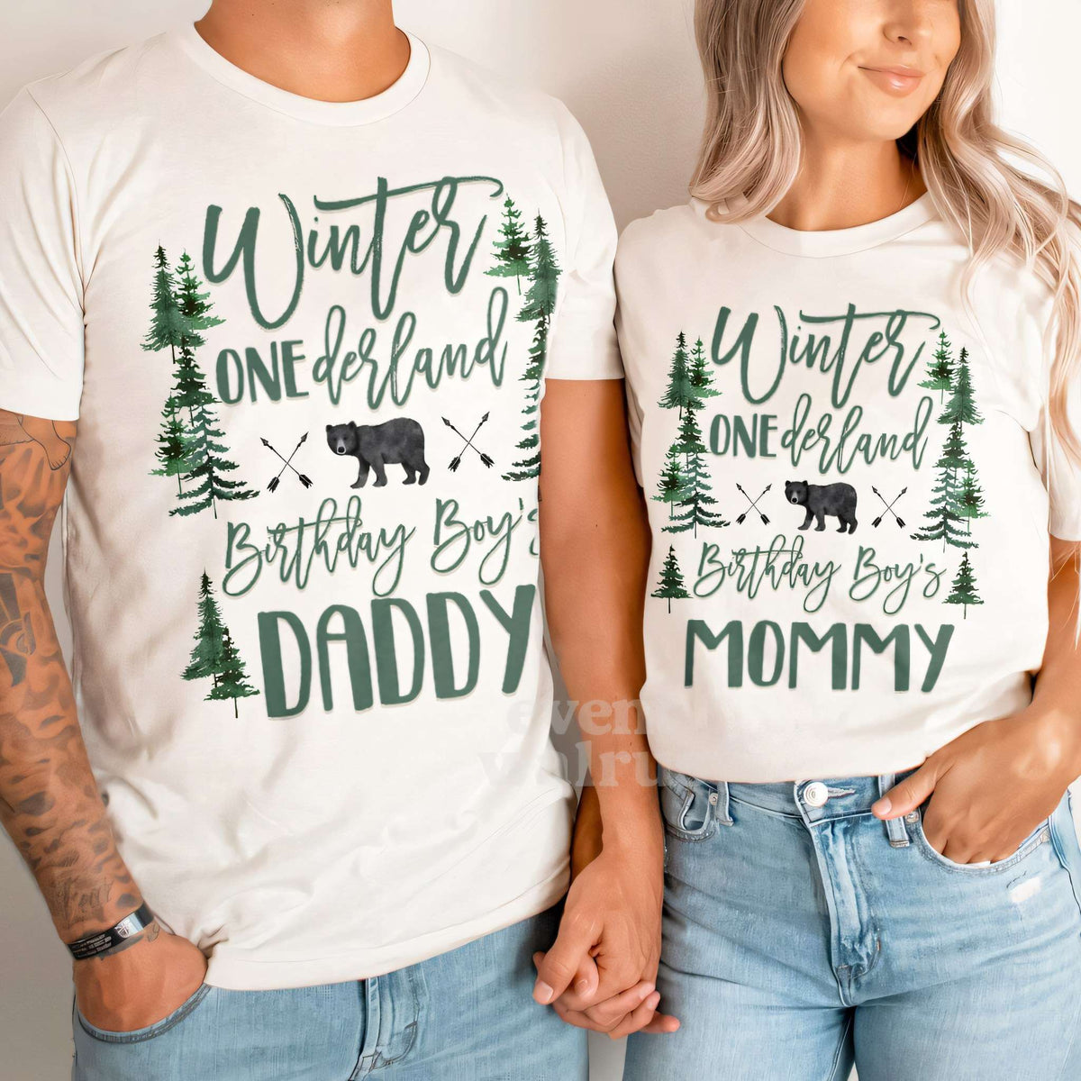 Dad and Mom holding hands in white Daddy and Mommy bear forest Winter ONEderland shirts.