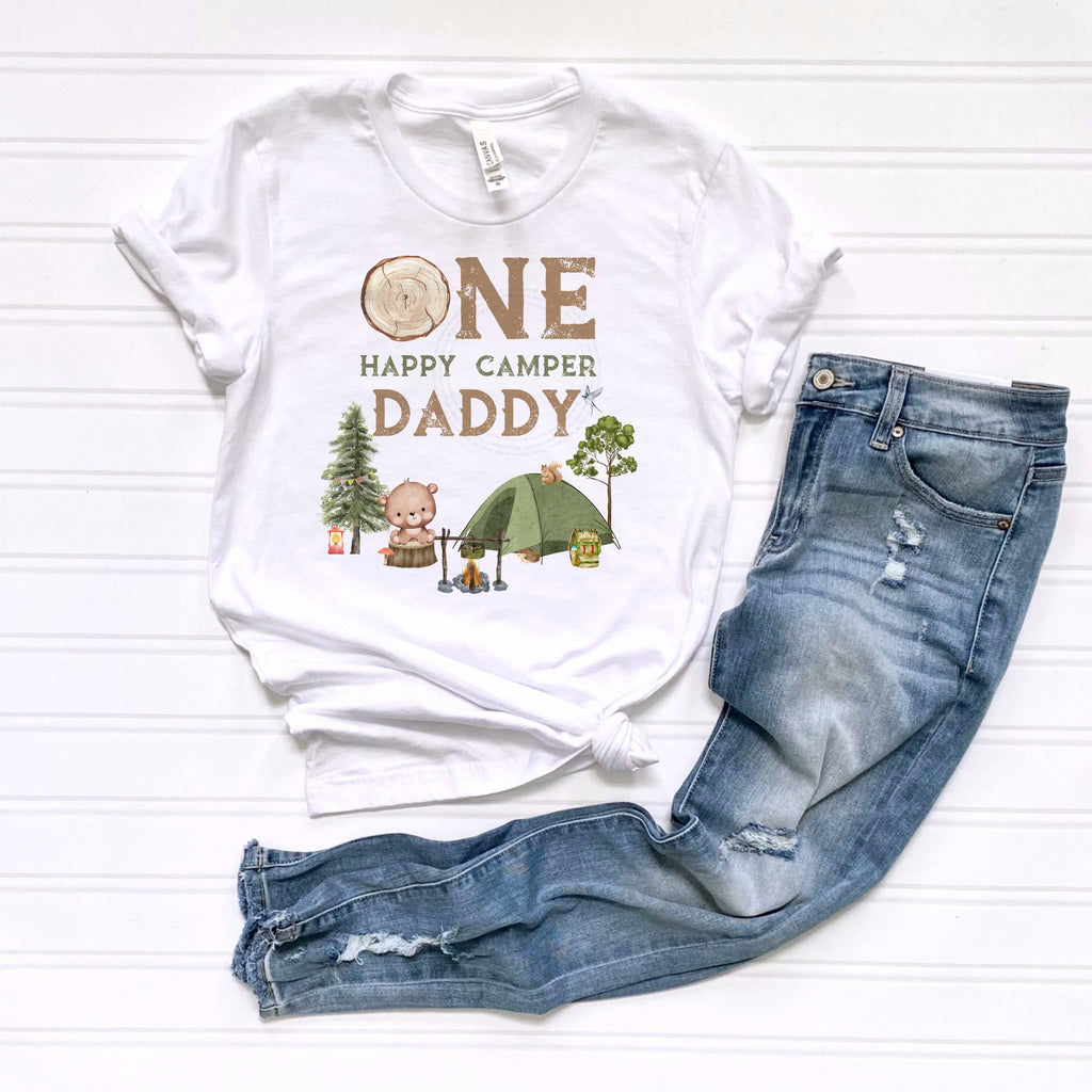 White One Happy Camper Daddy tee laid flat beside jeans.