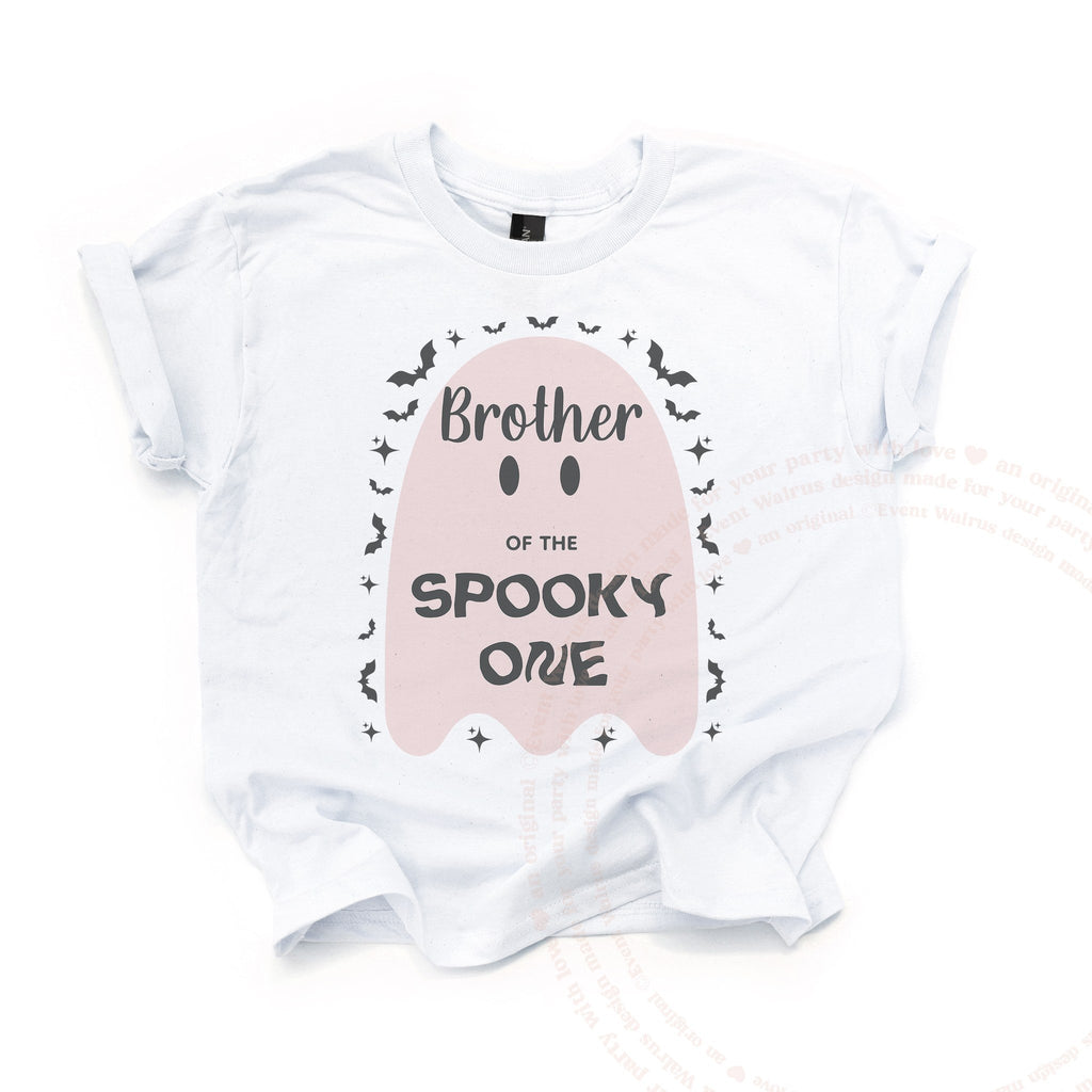 White Brother of the Spooky One kids tee laid flat, with the big blush ghost and tiny bats.