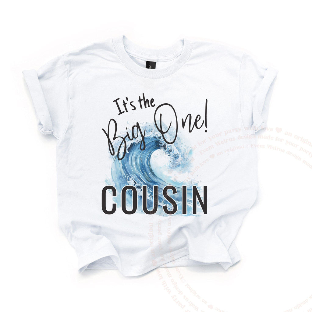 White kids It's the Big One Cousin tee with a watercolor wave, laid flat.