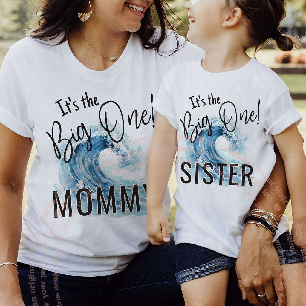 Girl in a white Sister wave shirt laughing with her mom in a Mommy shirt.