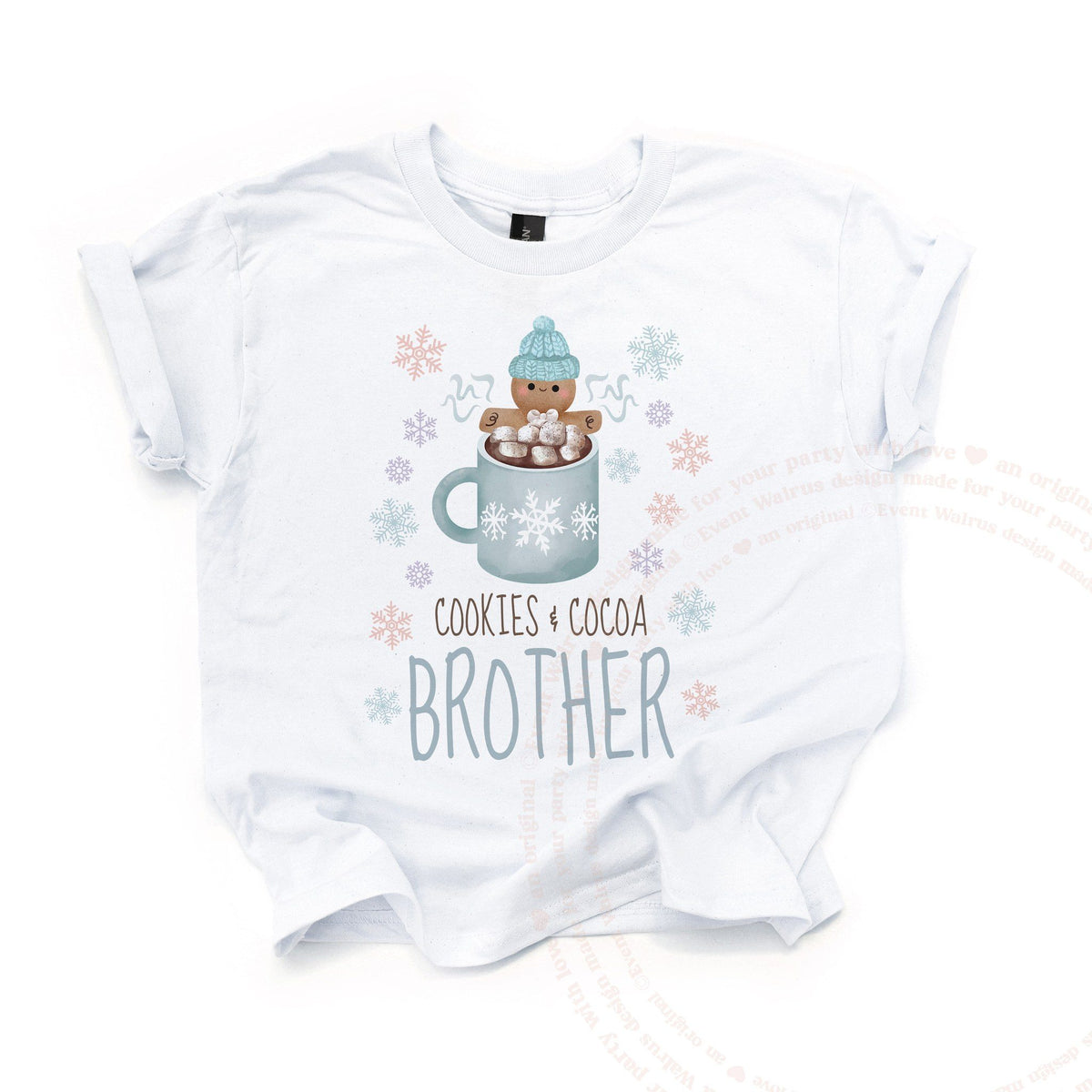 White Cookies and Cocoa Brother kids tee laid flat, with the gingerbread cookie and pastel snowflakes.