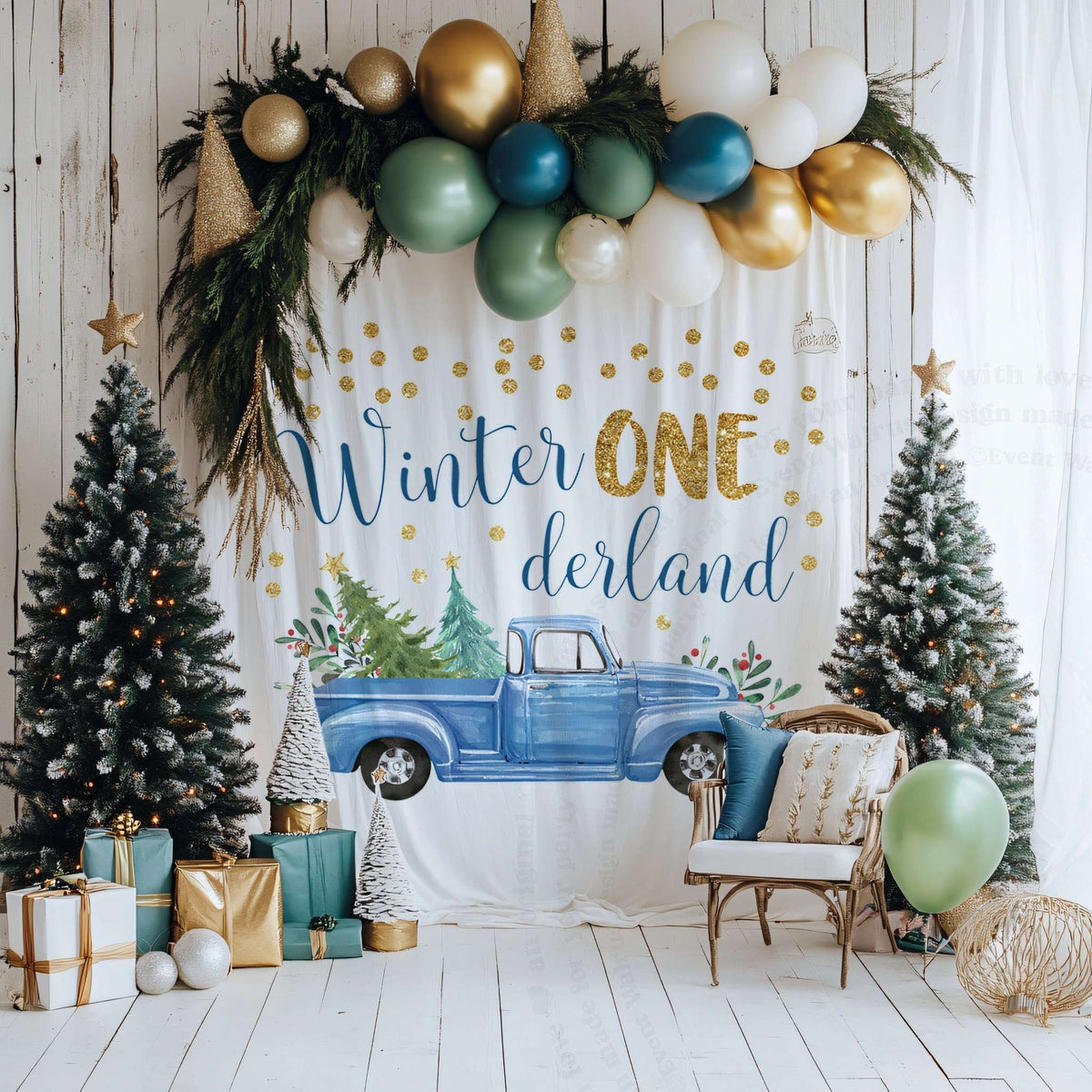 Blue pickup winter onederland backdrop between two Christmas trees with gifts and an armchair.