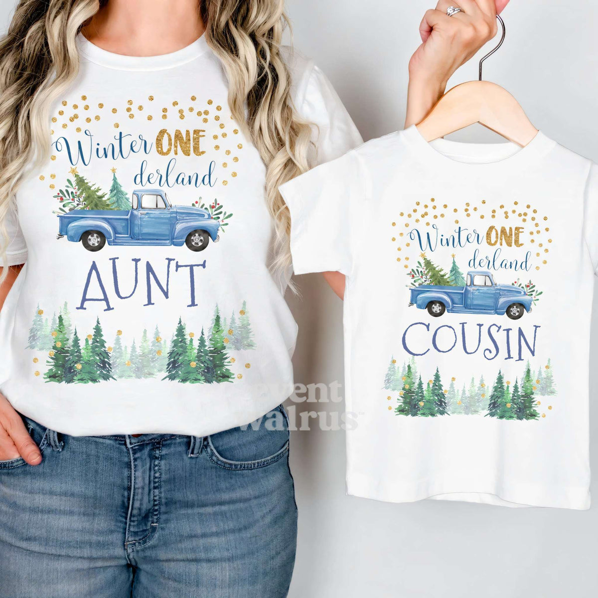 White Cousin blue truck tee on a hanger, held up by an aunt in her matching shirt.