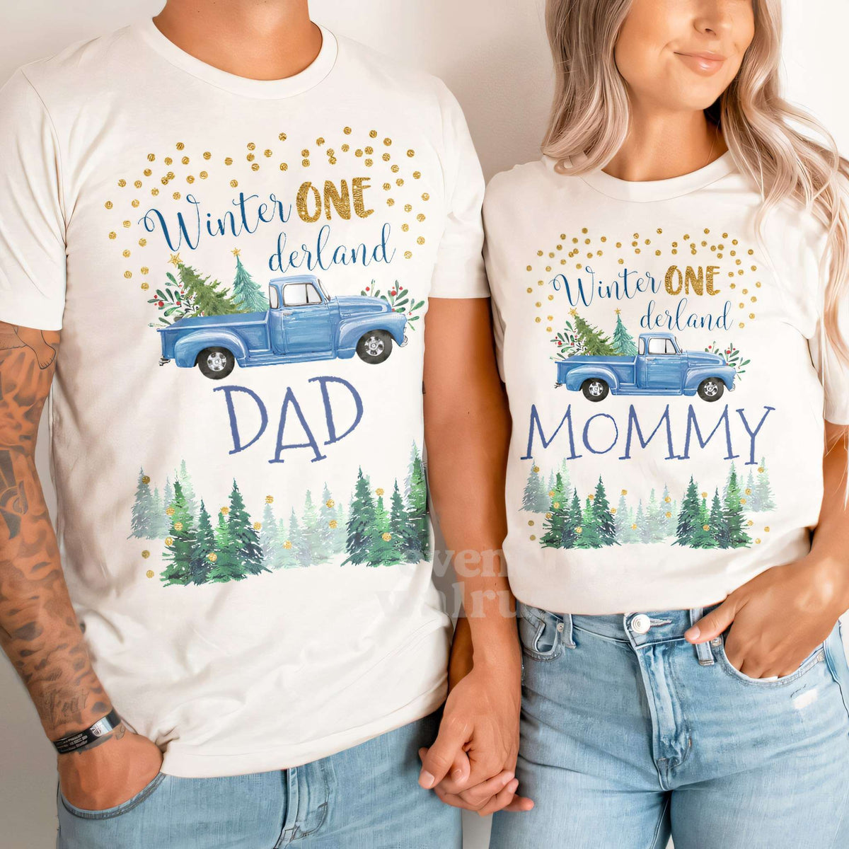 Dad and Mom holding hands in white Dad and Mommy blue truck Winter ONE derland shirts.