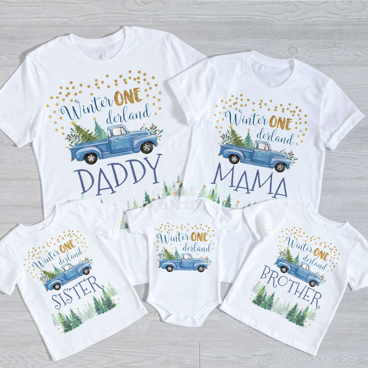 Daddy, Mama, Sister, Brother and baby blue truck Winter ONE derland shirts on gray wood.