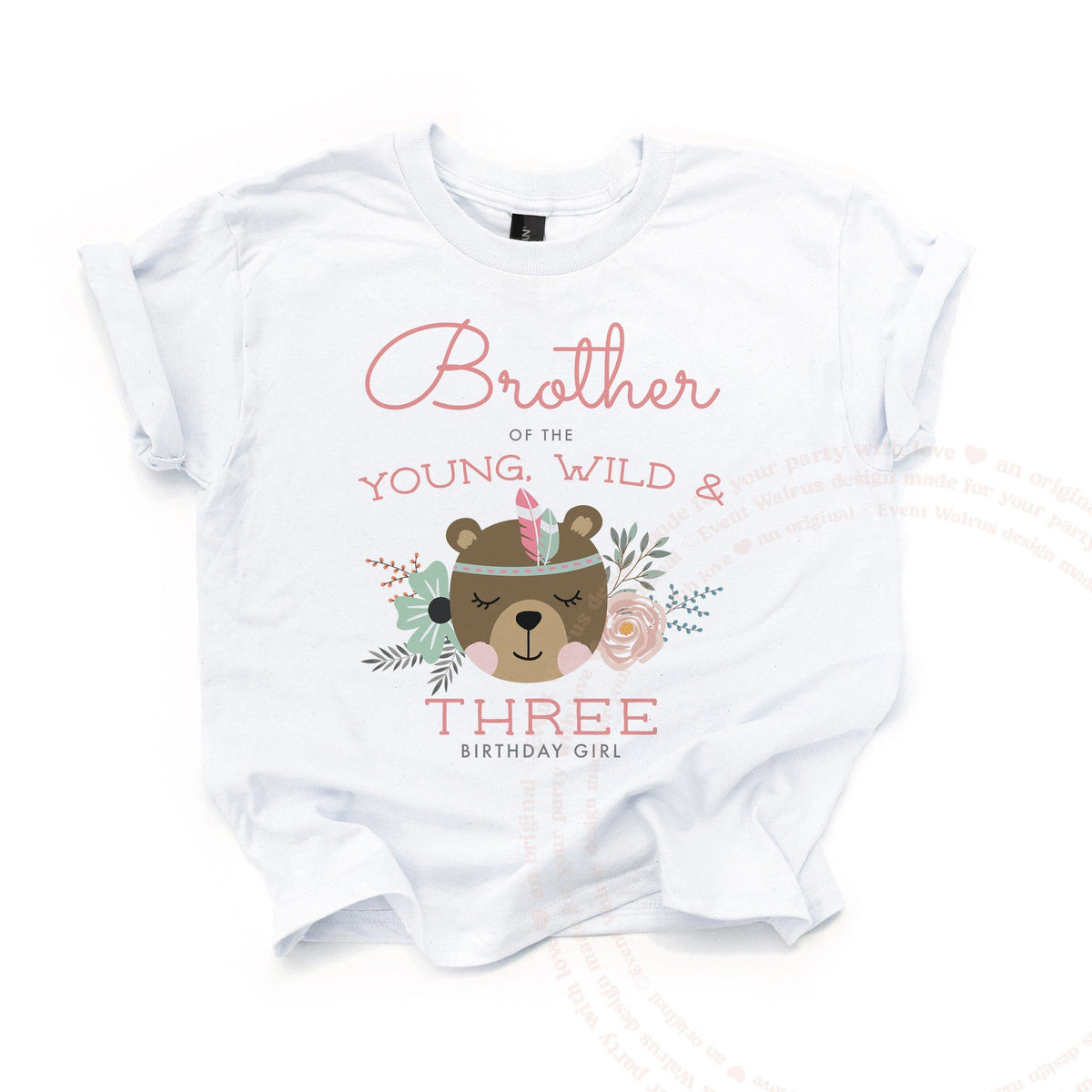 White Brother of the Young, Wild and Three kids tee laid flat, with the floral bear and pink script.