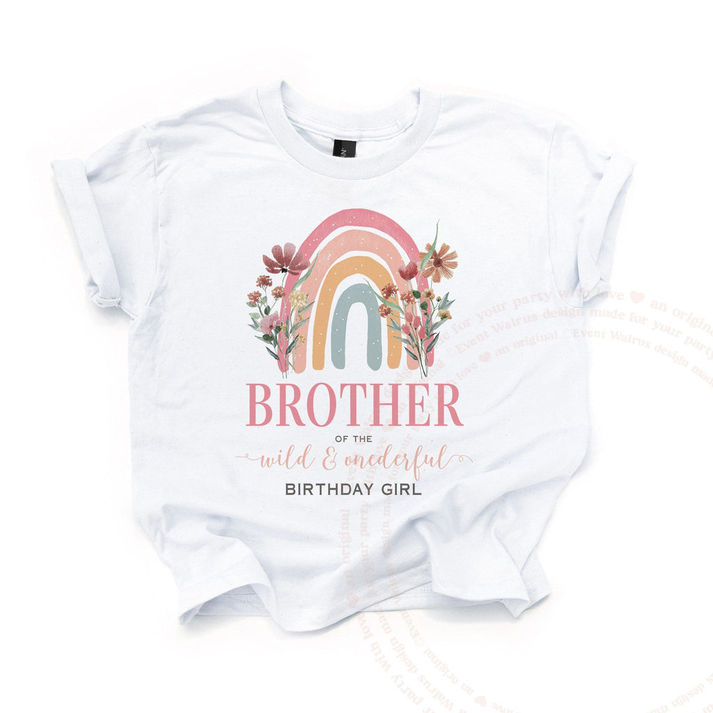 White Brother of the Wild and Onederful kids tee laid flat, with the boho rainbow and wildflowers.