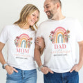Mom and Dad laughing together in white rainbow Wild and Onederful Birthday Girl shirts.