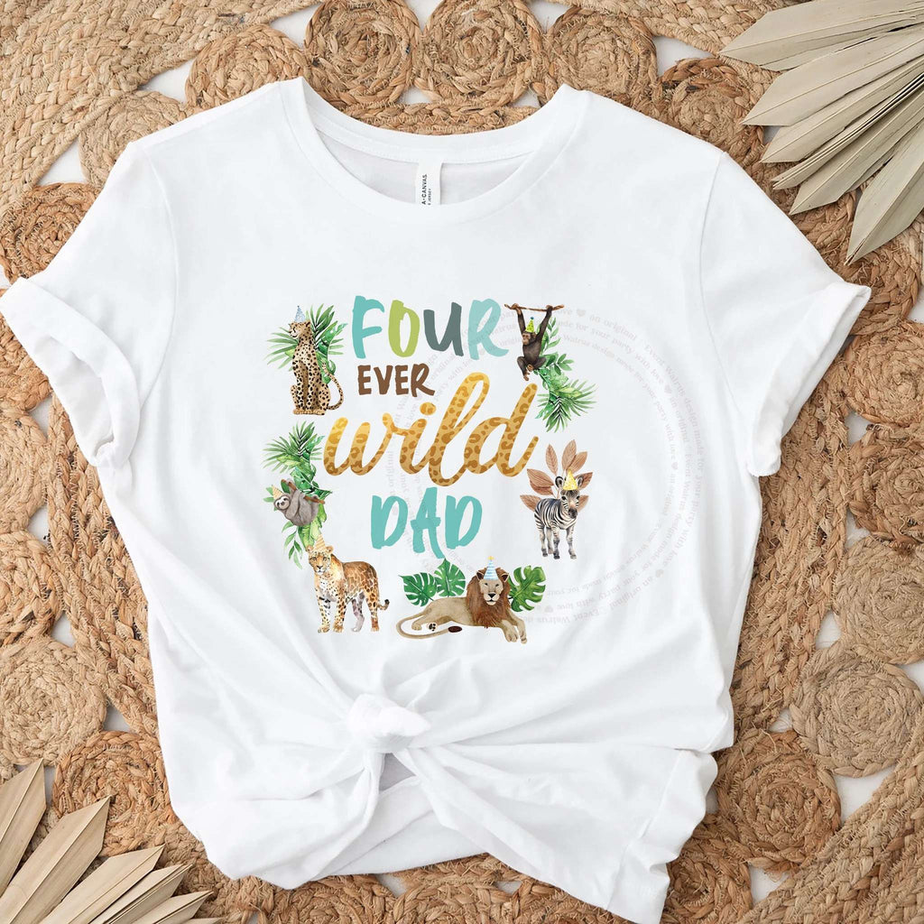 White Four Ever Wild Dad tee knotted on a jute rug with dried palm leaves.