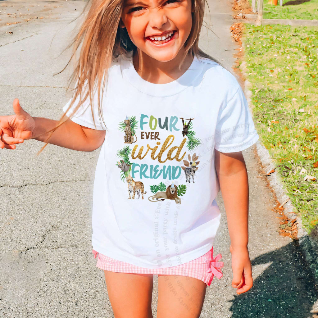 Laughing girl on a sidewalk in a white Four Ever Wild Friend shirt.