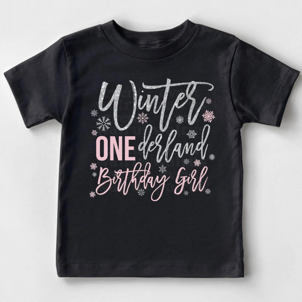 Black Winter ONEderland Birthday Girl toddler tee laid flat.