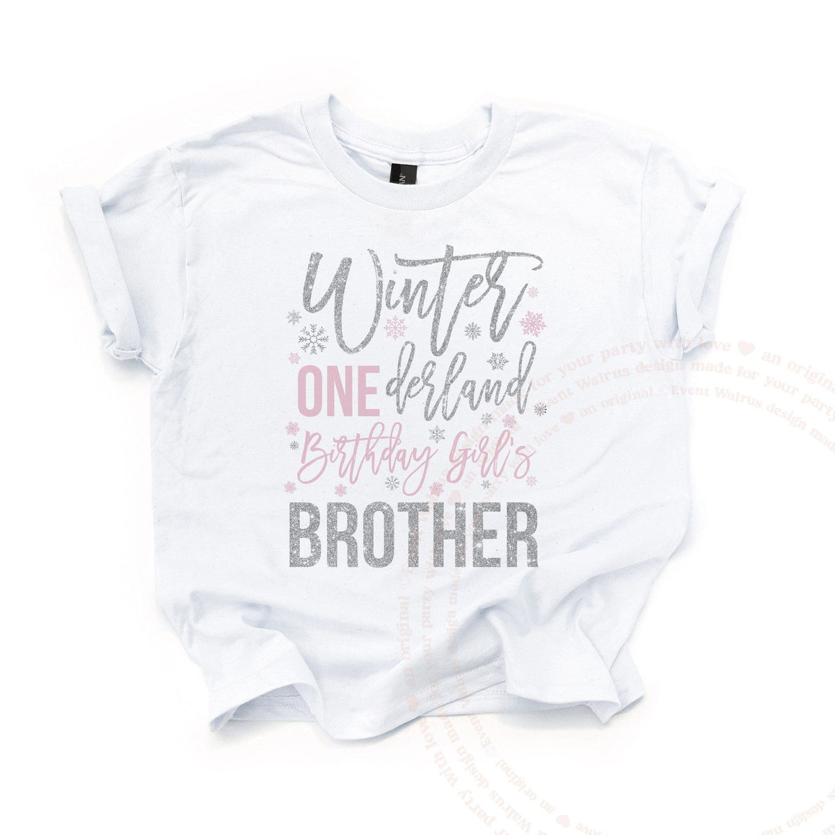 White Winter ONEderland Brother kids tee laid flat, with silver glitter script and a pink ONE.