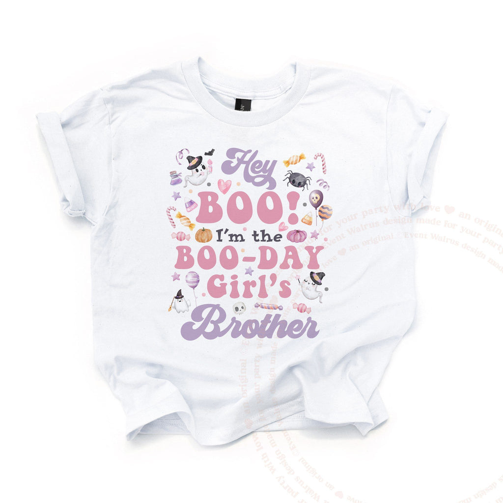 White Hey Boo Brother kids tee laid flat, with candy, ghosts and pink retro letters.