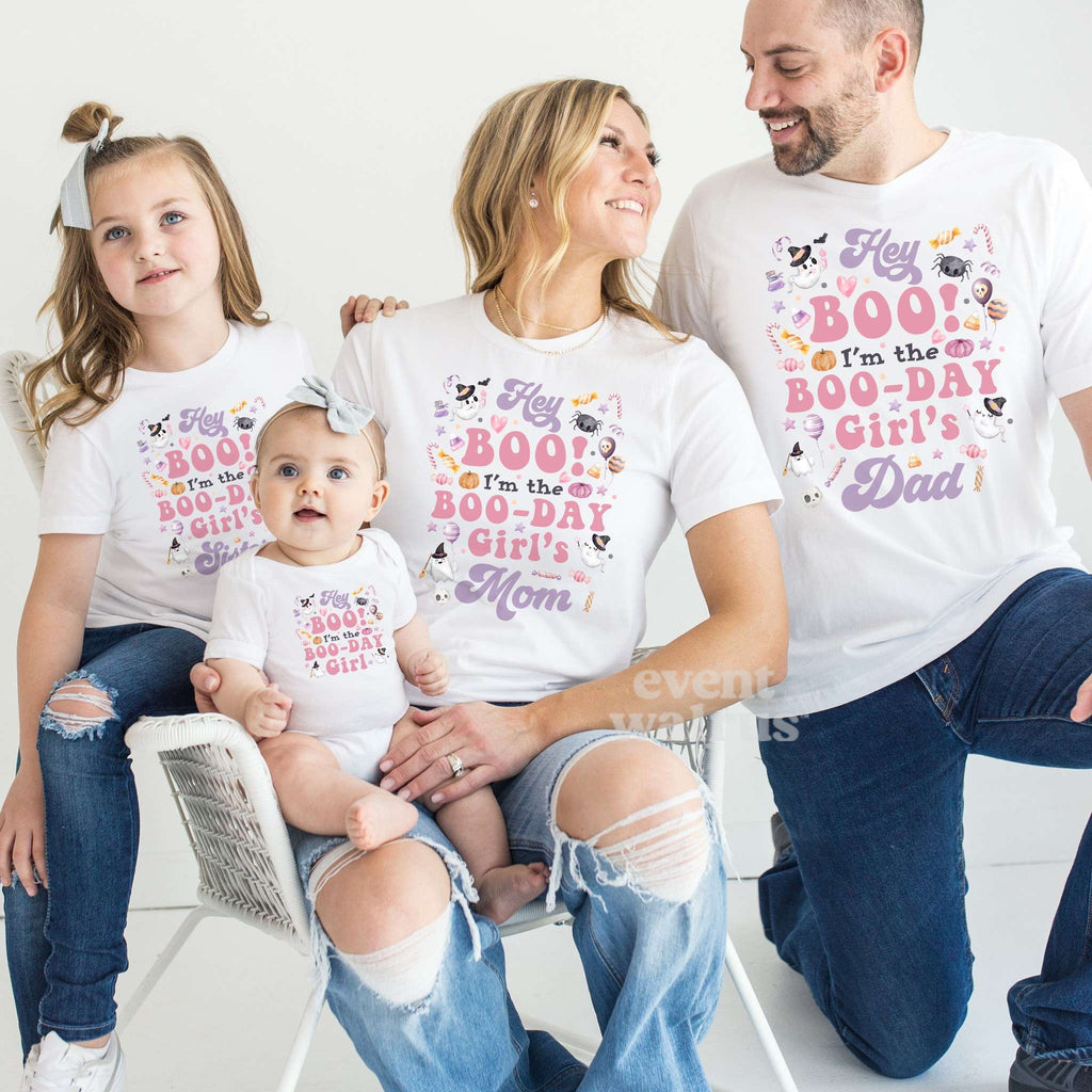 Mom, Dad, big sister and the baby all in white Hey Boo Boo-Day shirts.