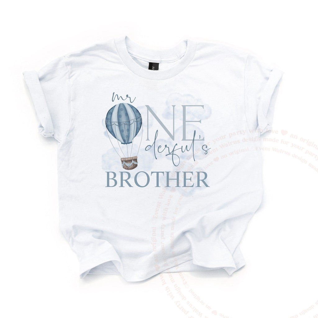 White Mr Onederful's Brother kids tee laid flat, with a blue hot air balloon.