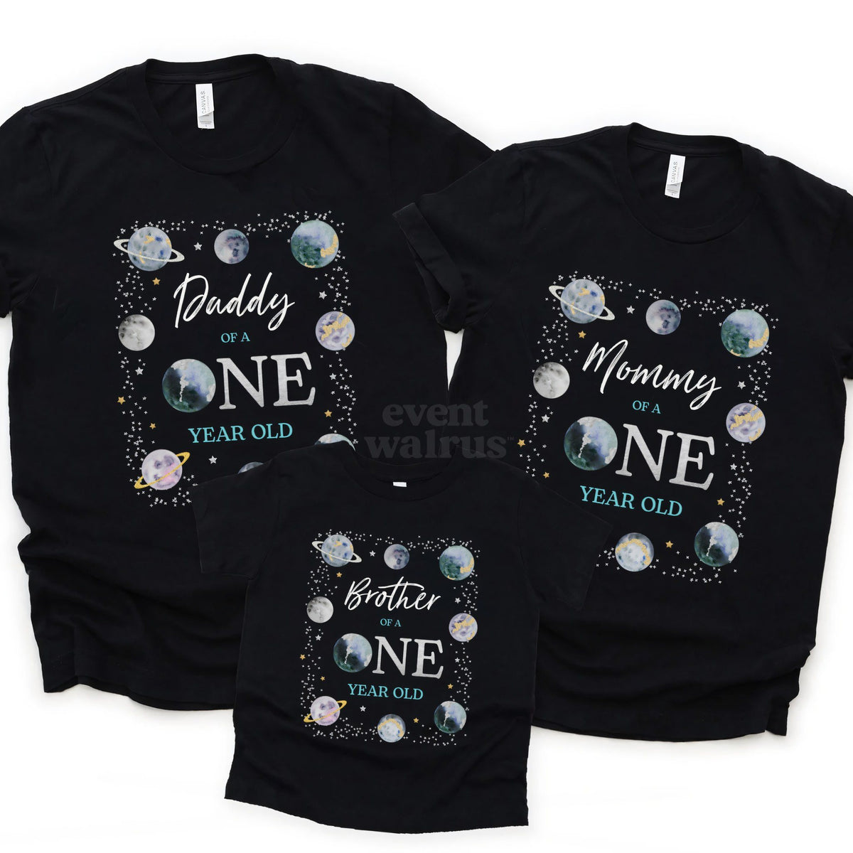Black Daddy, Mommy and Brother of a ONE Year Old space shirts laid together.