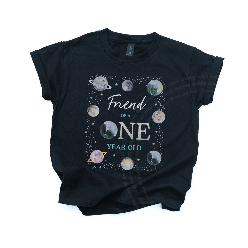Black kids Friend of a ONE Year Old space tee with silver stars, laid flat.
