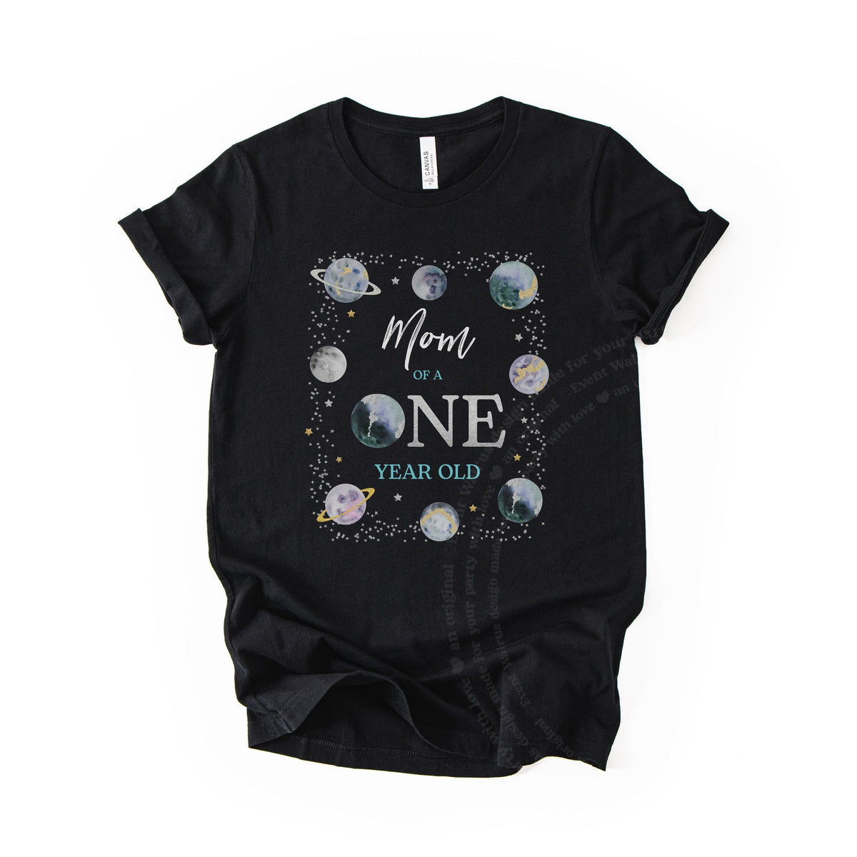 Black Mom of a ONE Year Old space tee with a planet for the O, laid flat.