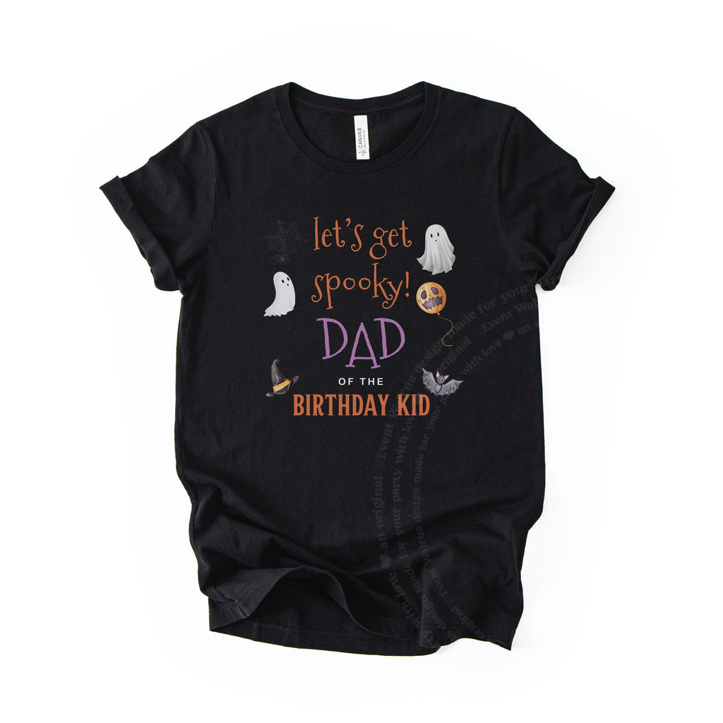 Black Dad of the Birthday Kid tee with ghosts, a bat and a pumpkin balloon, laid flat.