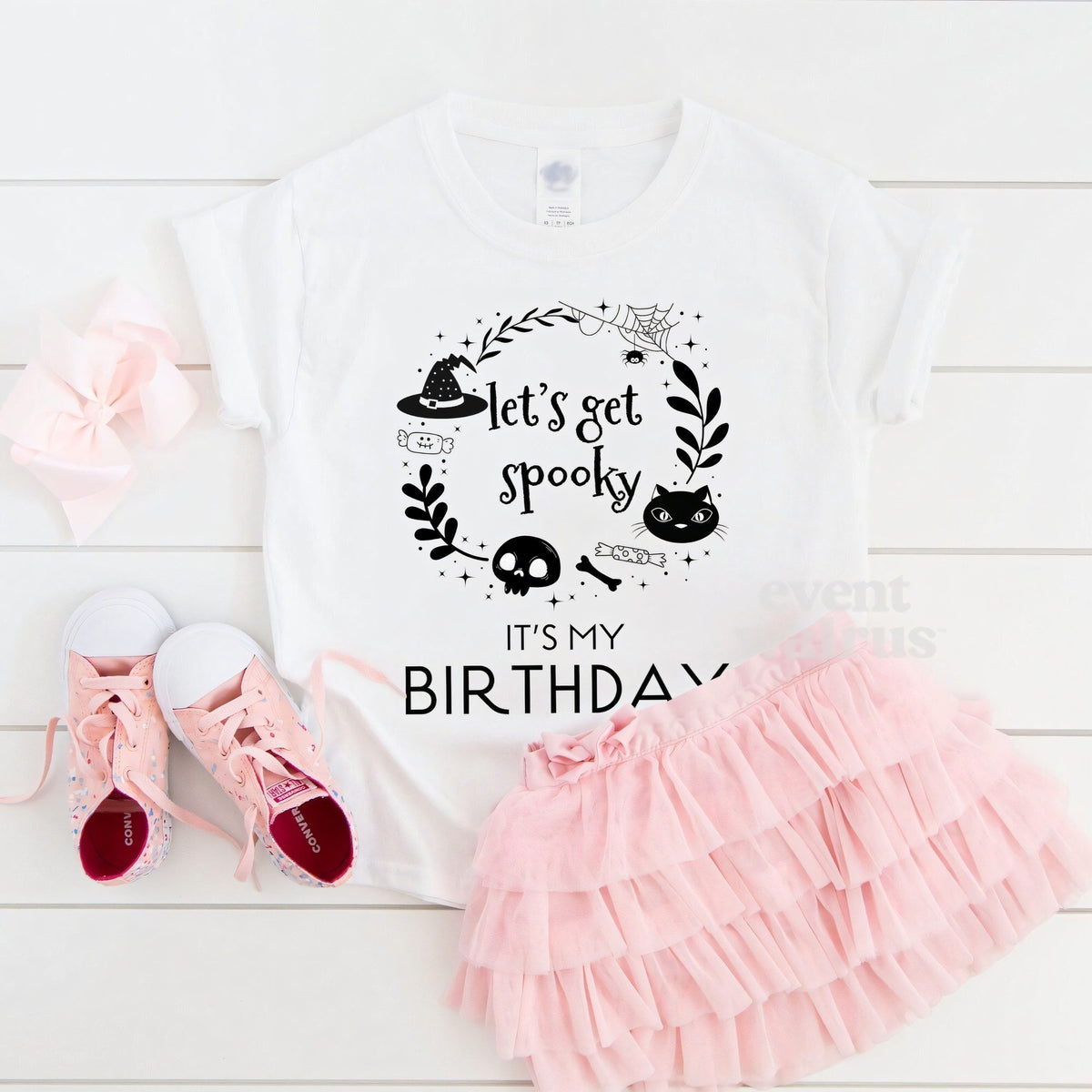White Let's Get Spooky It's My Birthday toddler tee laid flat with a pink tutu and sneakers.