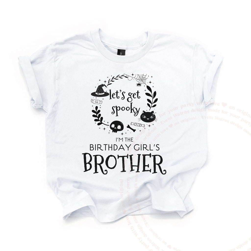 White Let's Get Spooky Brother kids tee laid flat, with a witch hat, black cat and skull wreath.