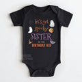 Black baby bodysuit reading Let's Get Spooky Sister of the Birthday Kid.