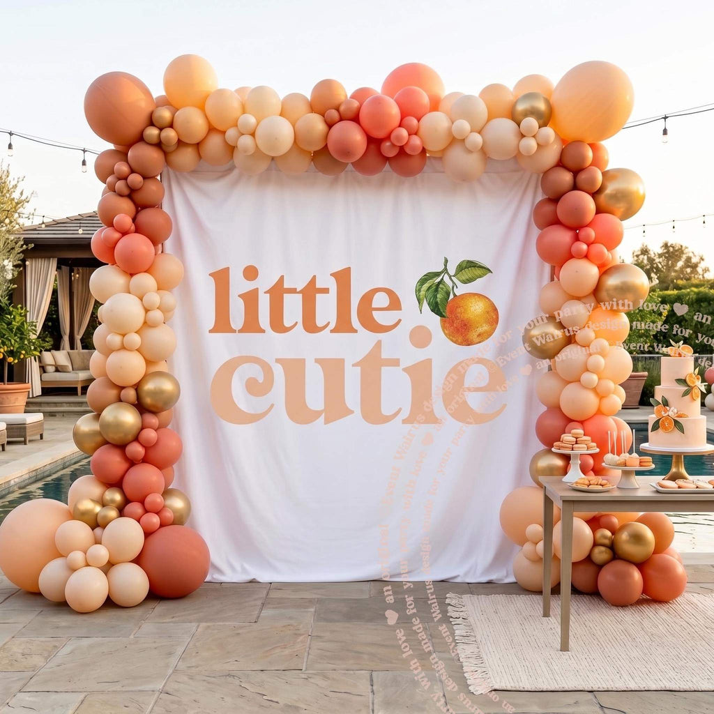 Clementine birthday backdrop on a pool patio with orange and blush balloons and a cake.
