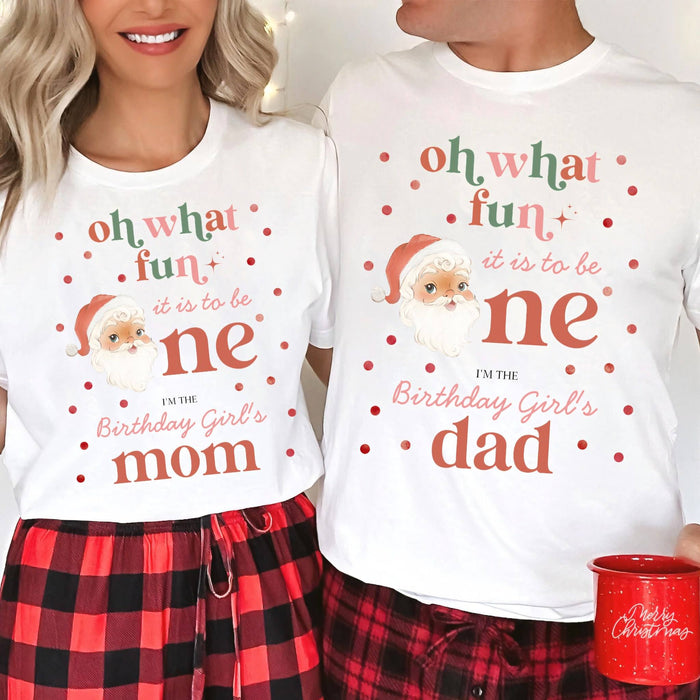 Mom and Dad in plaid pajama pants and white Oh What Fun Birthday Girl's Mom and Dad shirts.