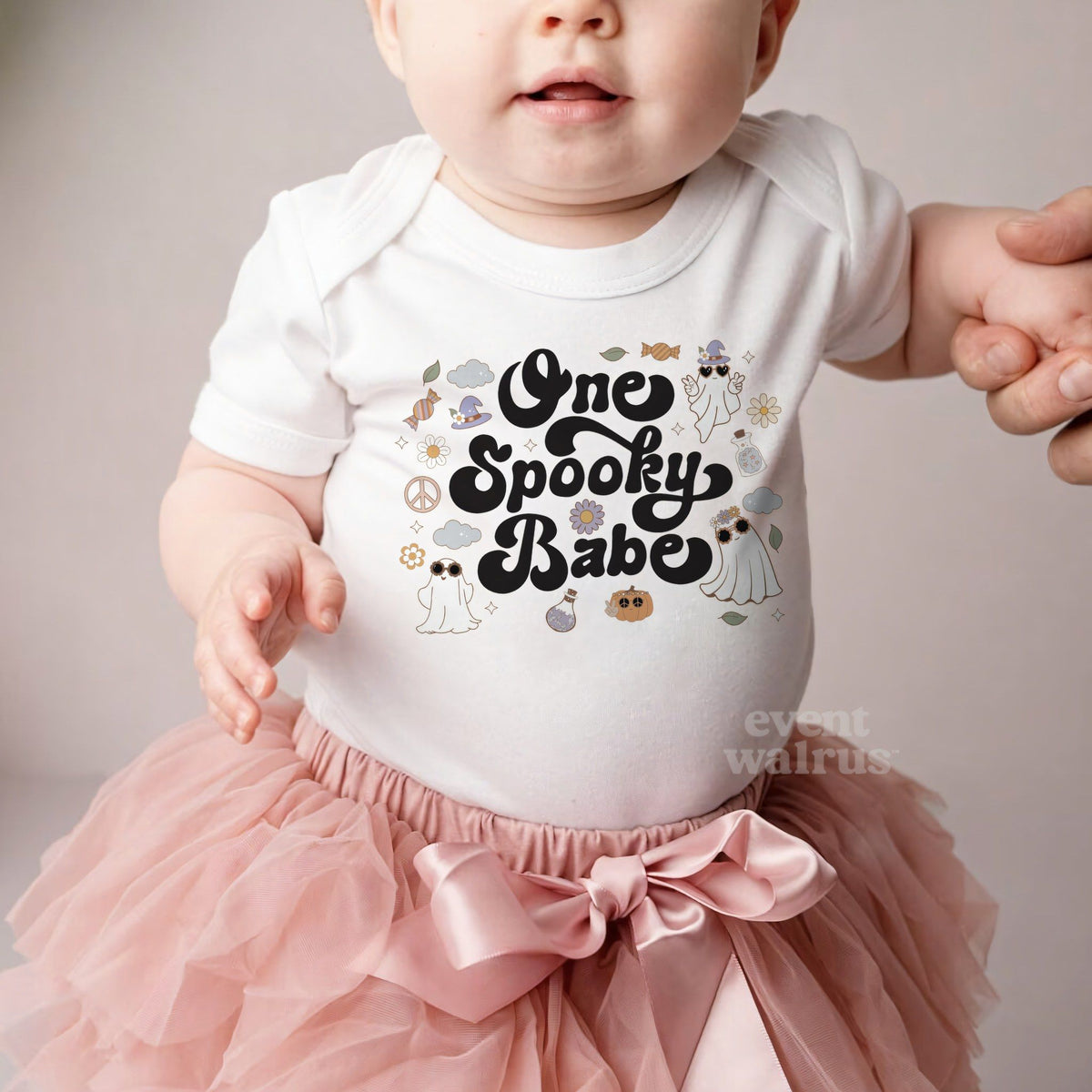 Baby girl in a pink tutu and a white One Spooky Babe bodysuit.
