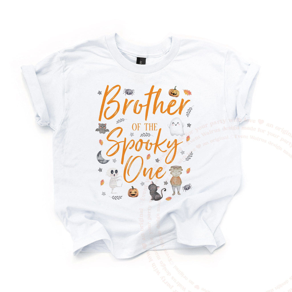 White Brother of the Spooky One kids tee laid flat, with a mummy, black cat and little ghost.