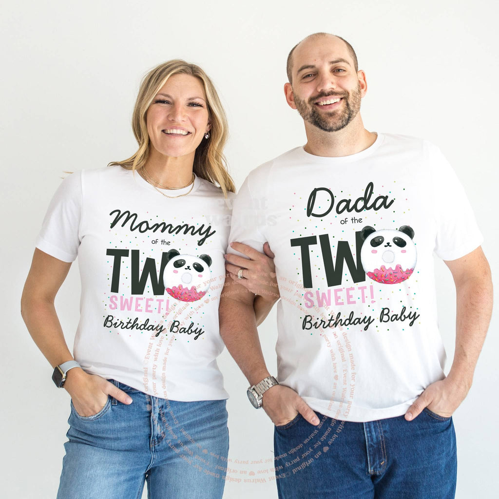 Mom and Dad standing together in white Mommy and Dada panda Two Sweet shirts.