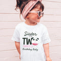 Girl in sunglasses and a pink headband wearing a white Sister of the Two Sweet panda shirt.