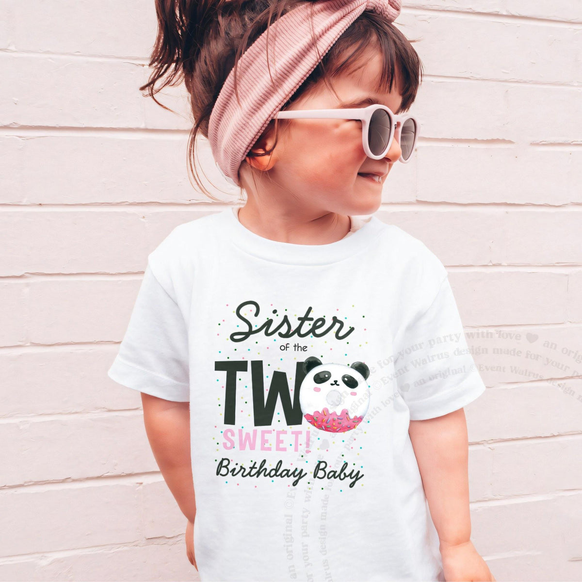 Girl in sunglasses and a pink headband wearing a white Sister of the Two Sweet panda shirt.