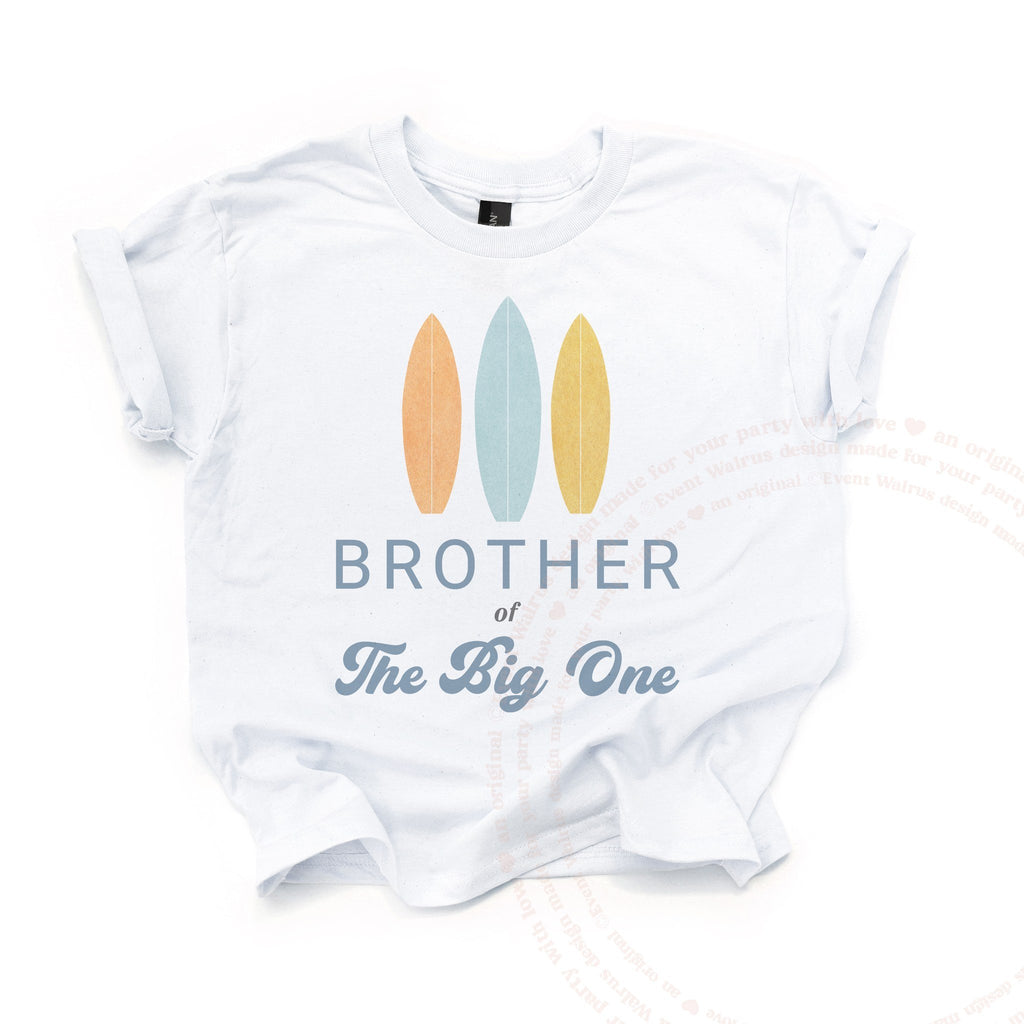 White kids Brother of The Big One tee with three pastel surfboards, laid flat.