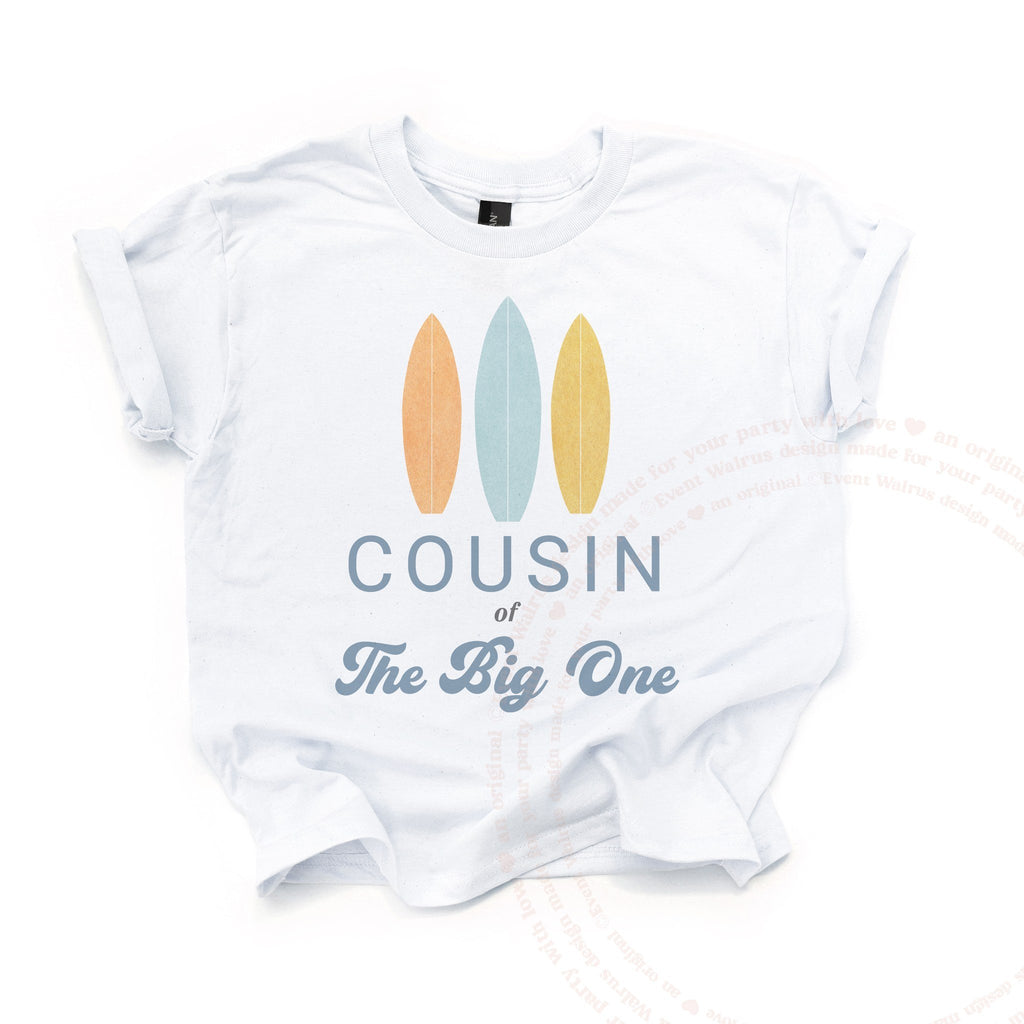 White kids Cousin of The Big One tee with orange, blue and yellow surfboards.
