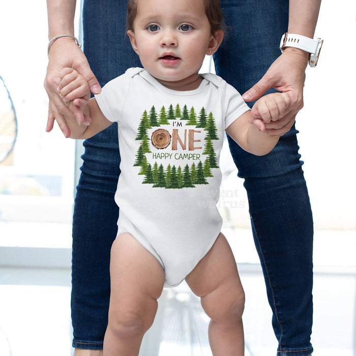 Baby taking steps while holding Mom's hands, in a white I'm One Happy Camper bodysuit.
