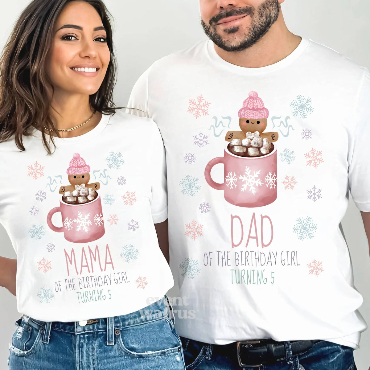 Mom and Dad smiling in white Mama and Dad Cookies and Cocoa 5th birthday shirts.