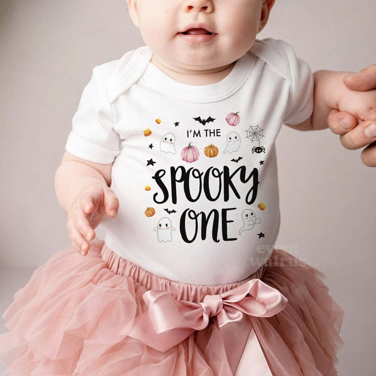 Baby girl in a pink tutu and a white I'm the Spooky One bodysuit.