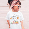 Girl in sunglasses and a pink headband wearing a white Sister of the Little Pumpkin shirt.