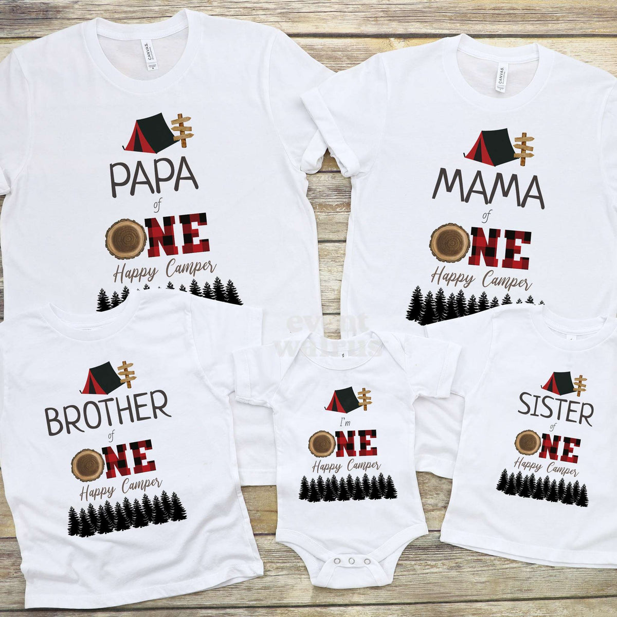 Papa, Mama, Brother, Sister and baby red plaid One Happy Camper shirts on wood.
