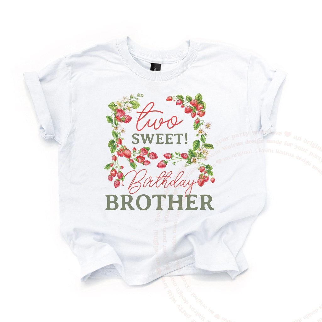 White Two Sweet Birthday Brother kids tee laid flat, with the strawberry vine wreath.