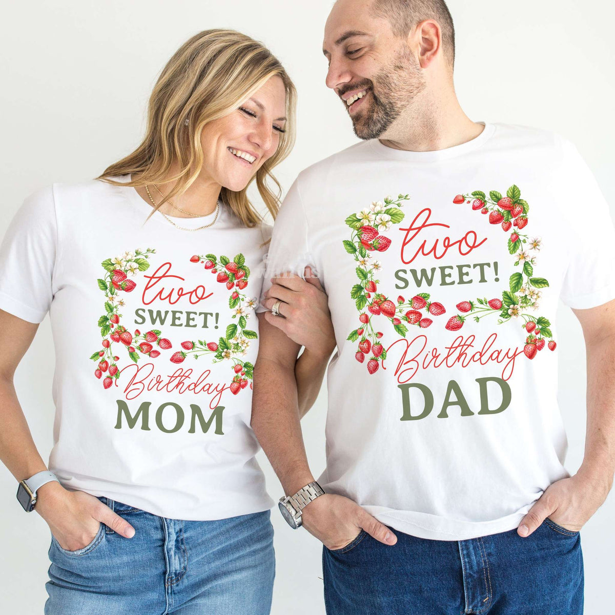 Mom and Dad laughing together in white Two Sweet Birthday Mom and Dad shirts.