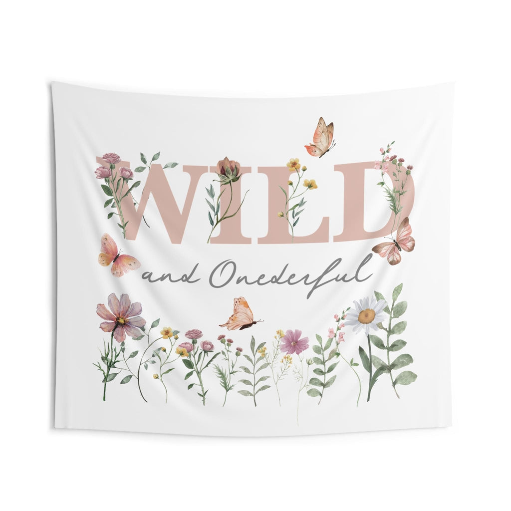 Wild and Onederful backdrop with pink WILD lettering, gray script, butterflies and a wildflower border on white.