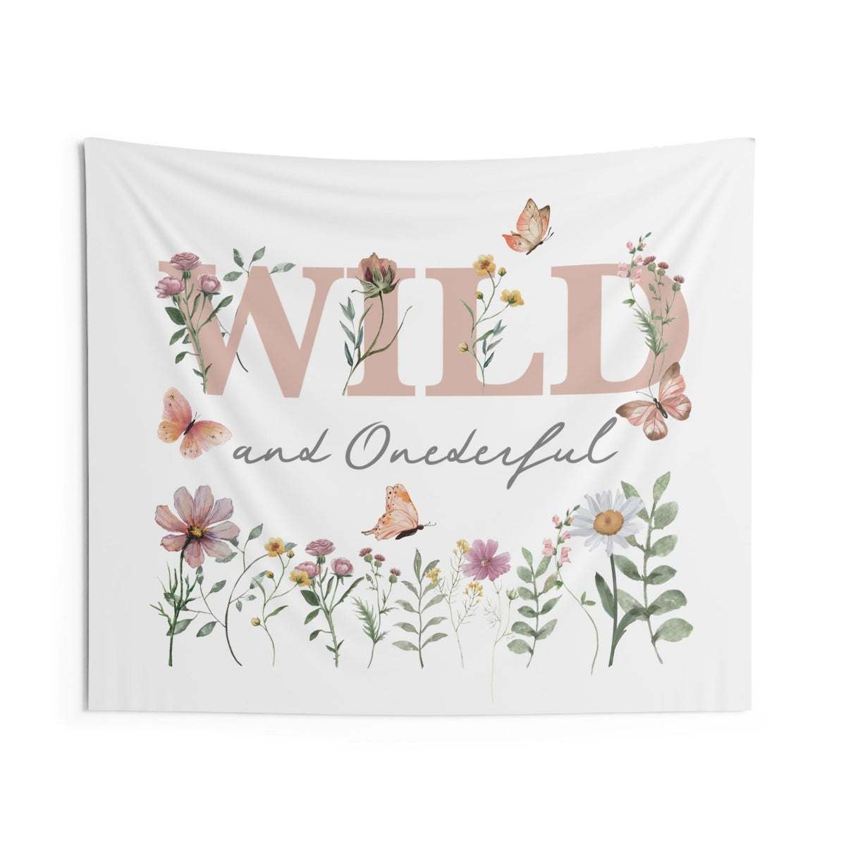 Boho first birthday backdrop reading Wild and Onederful, with peach butterflies and watercolor daisies.