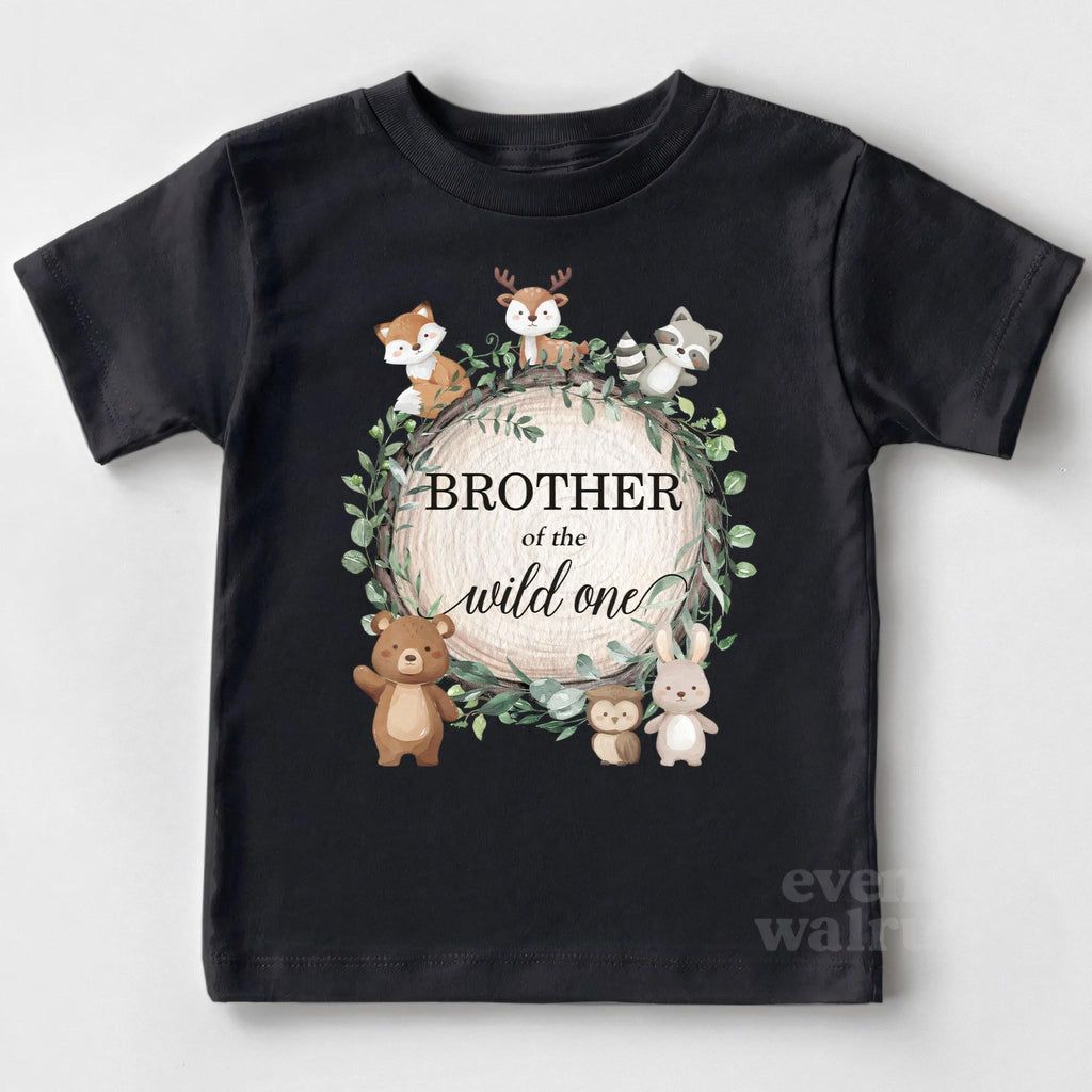 Black Brother of the Wild One toddler tee laid flat with the woodland wreath.